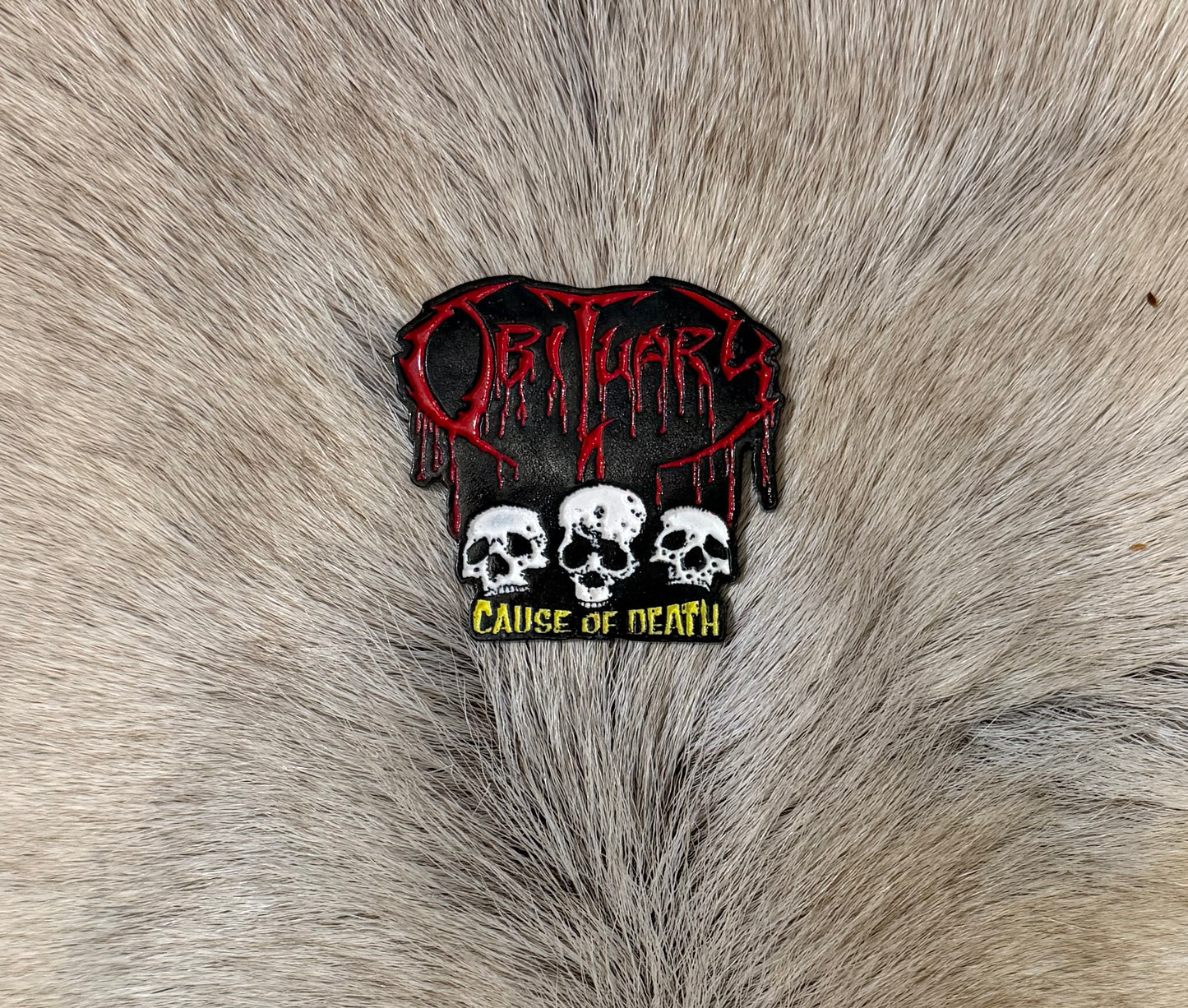 Obituary - Cause Of Death Skulls Metal Pin