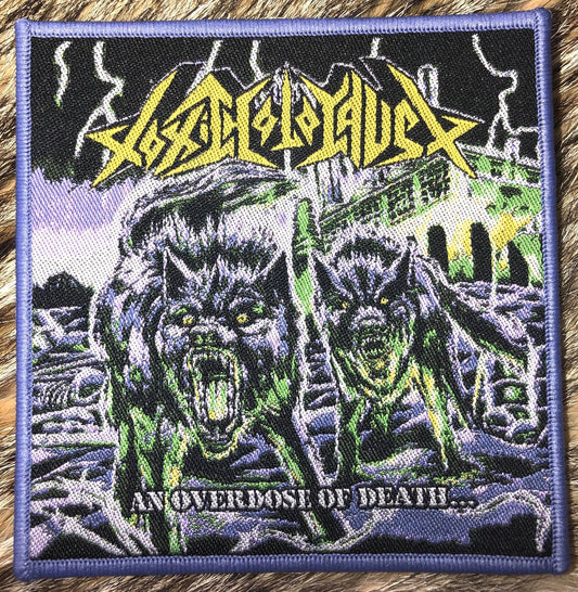 Toxic Holocaust - An Overdose of Death Various Coloured Border Patch